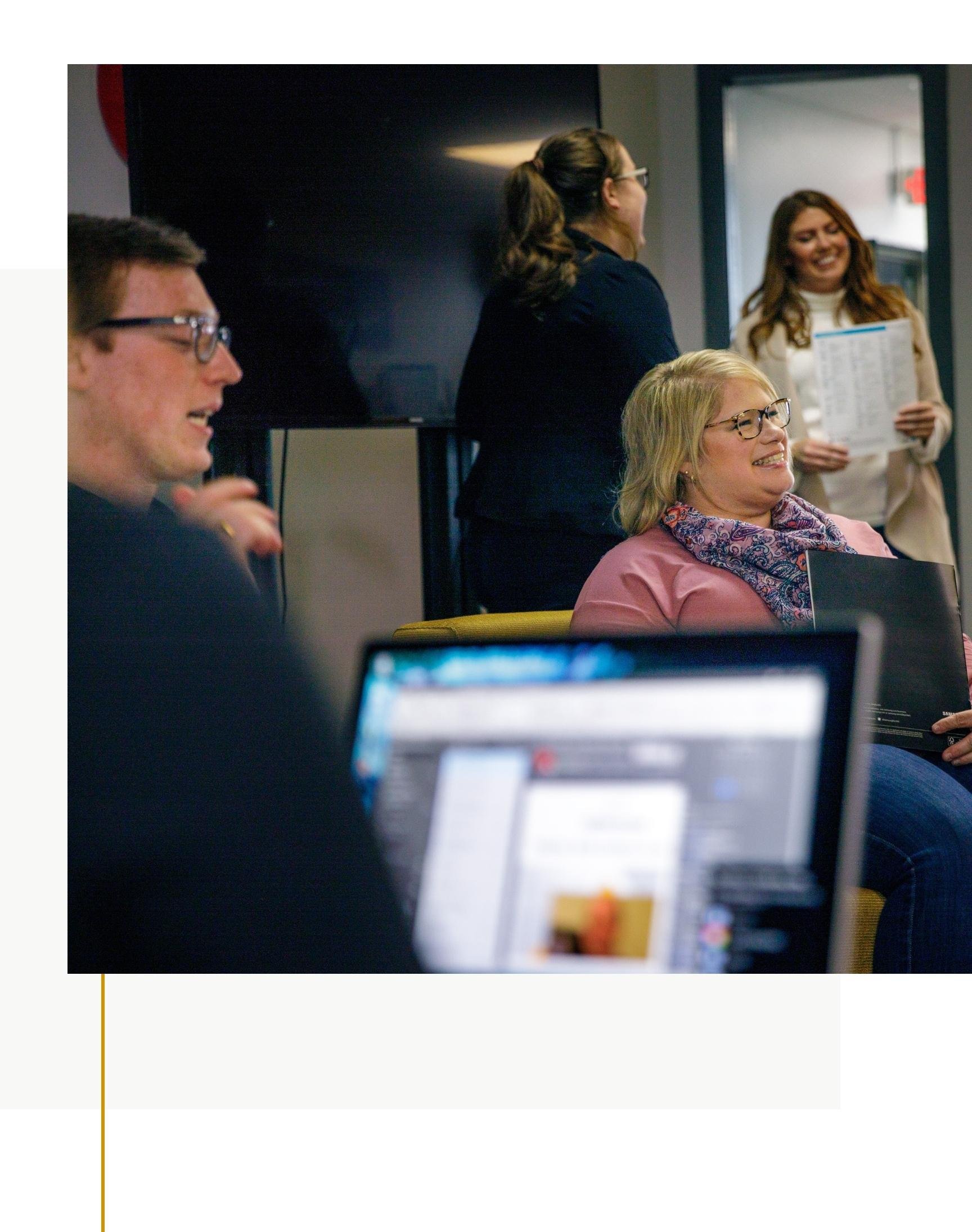 Employees meeting and smiling