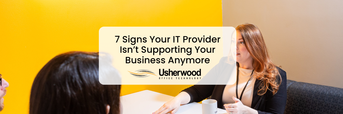 7 Signs Your IT Support Isn’t Supporting Your Business Anymore on top of a photo of a women talking 