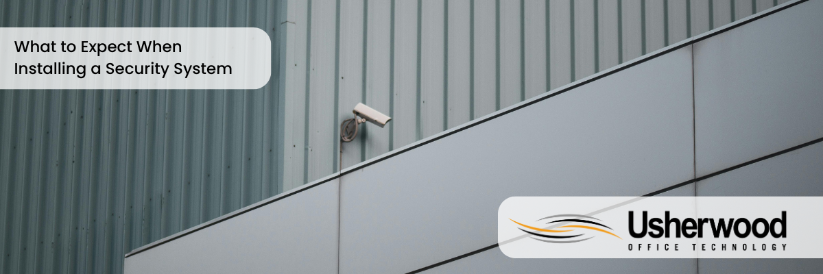 security camera camera with title What to Expect When Installing a Security System in the corner